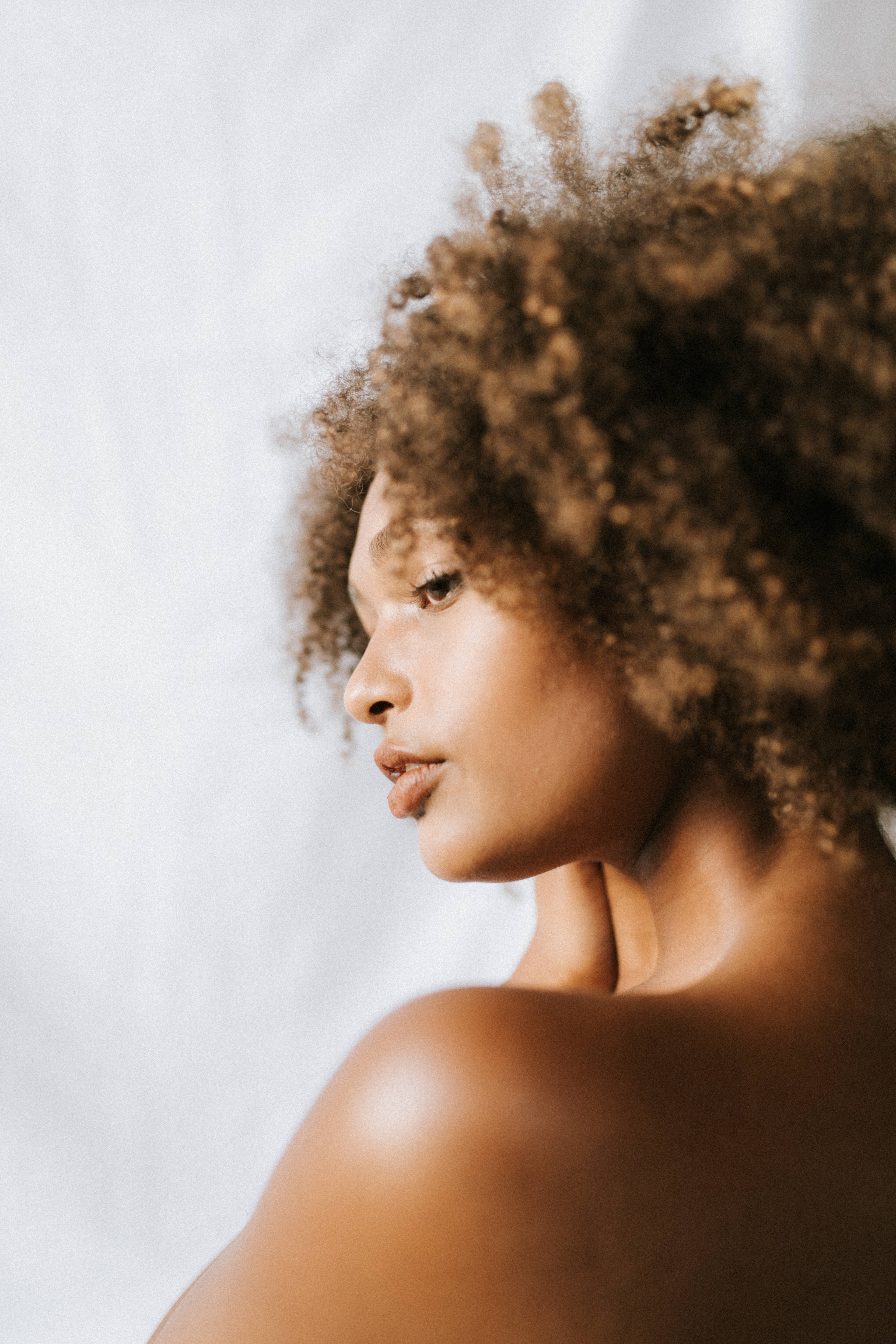 black woman with natural curly hair
