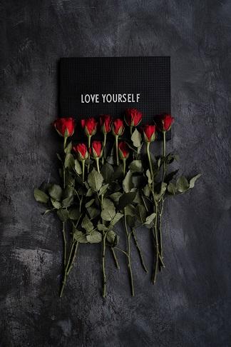 Roses with a love yourself sign