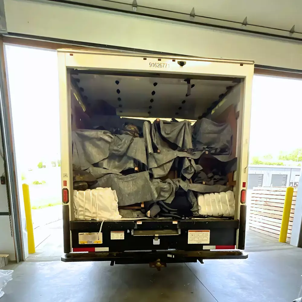 100 Barnwood Chairs in Delivery Truck