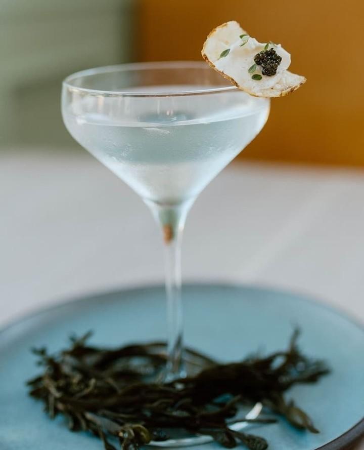 Vodka in a martini glass paired with caviar