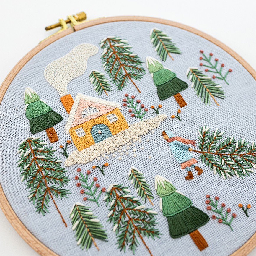 This is an image of whipped back stitch on the trees in the Winter Wonderland pattern.