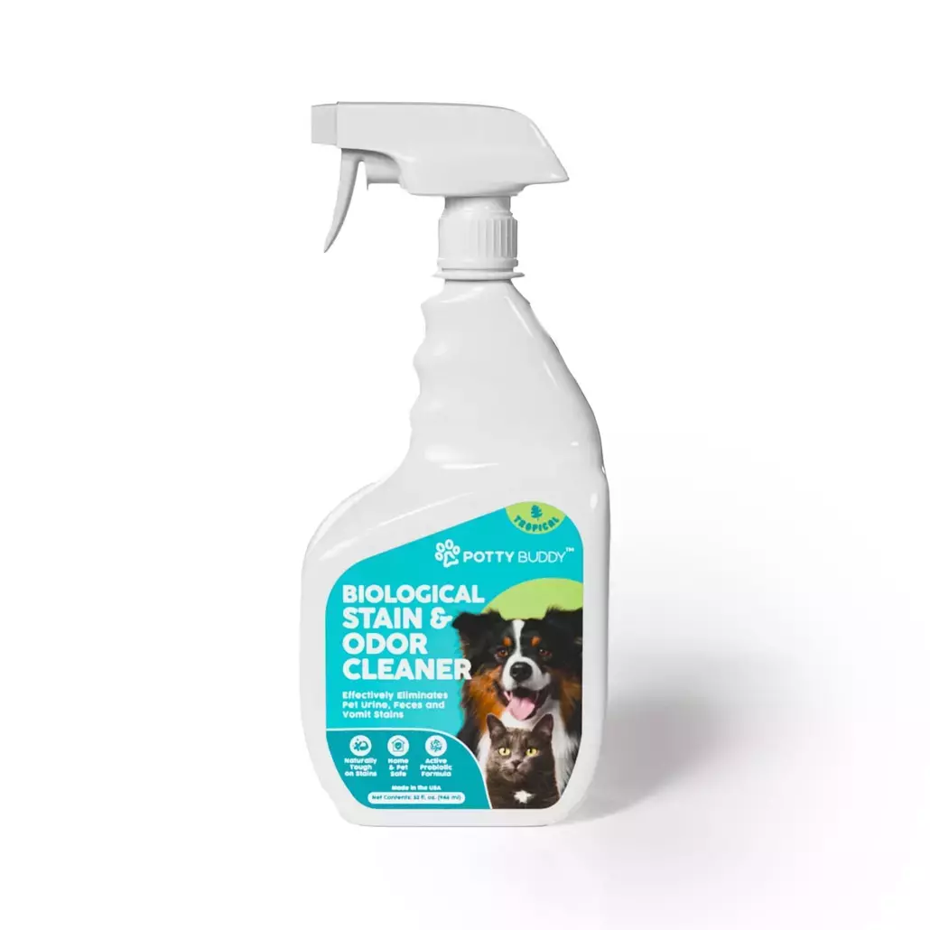 A dog sitting on a dog pet, with a hand holding a probiotic cleaning spray for pets