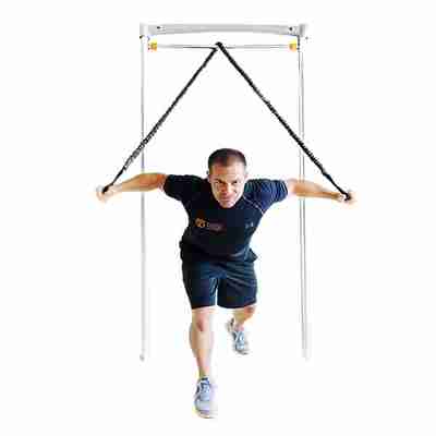 Fit man on door gym with resistance band and adjustable pull up bar