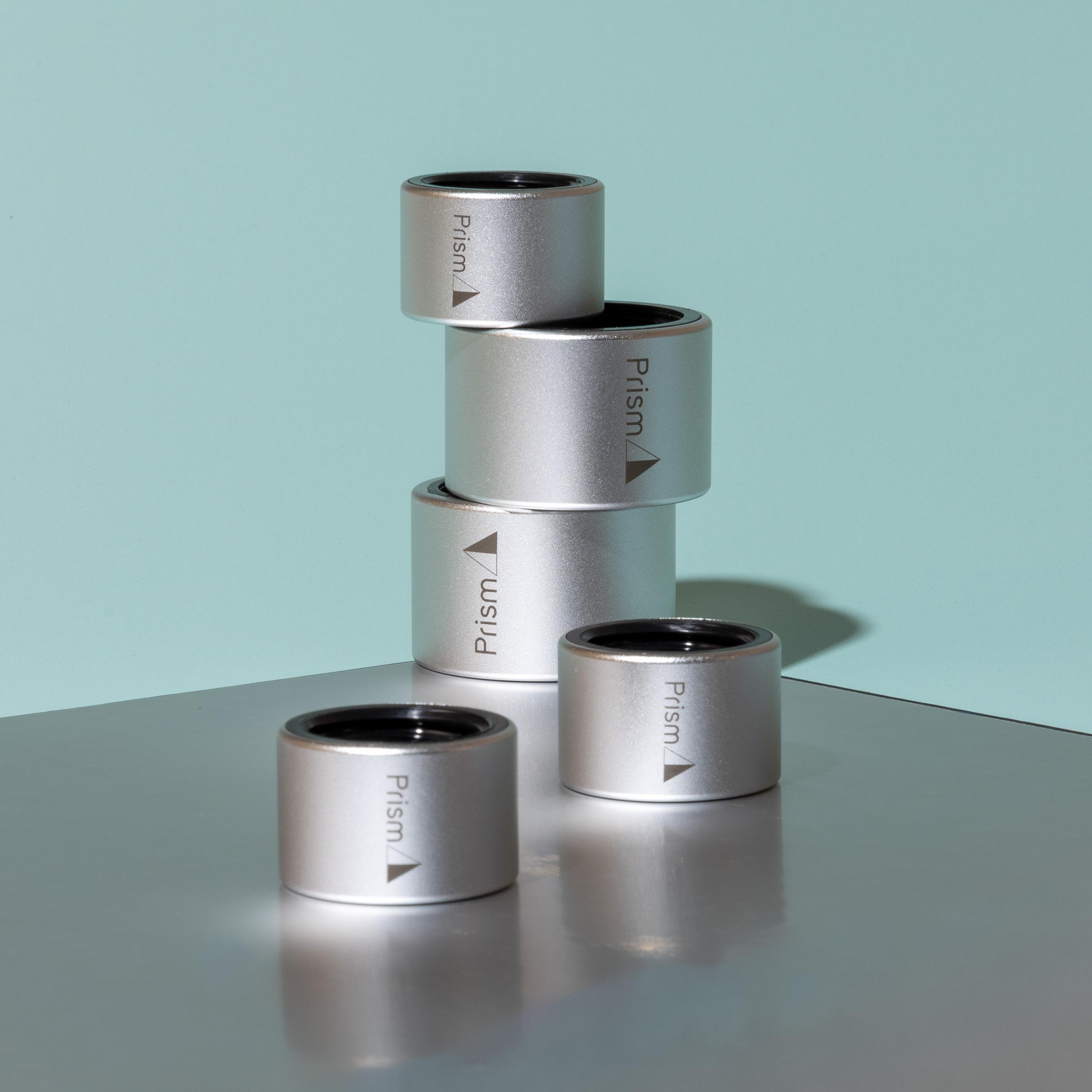 An image of a stack of five silver Prism Halo connectors