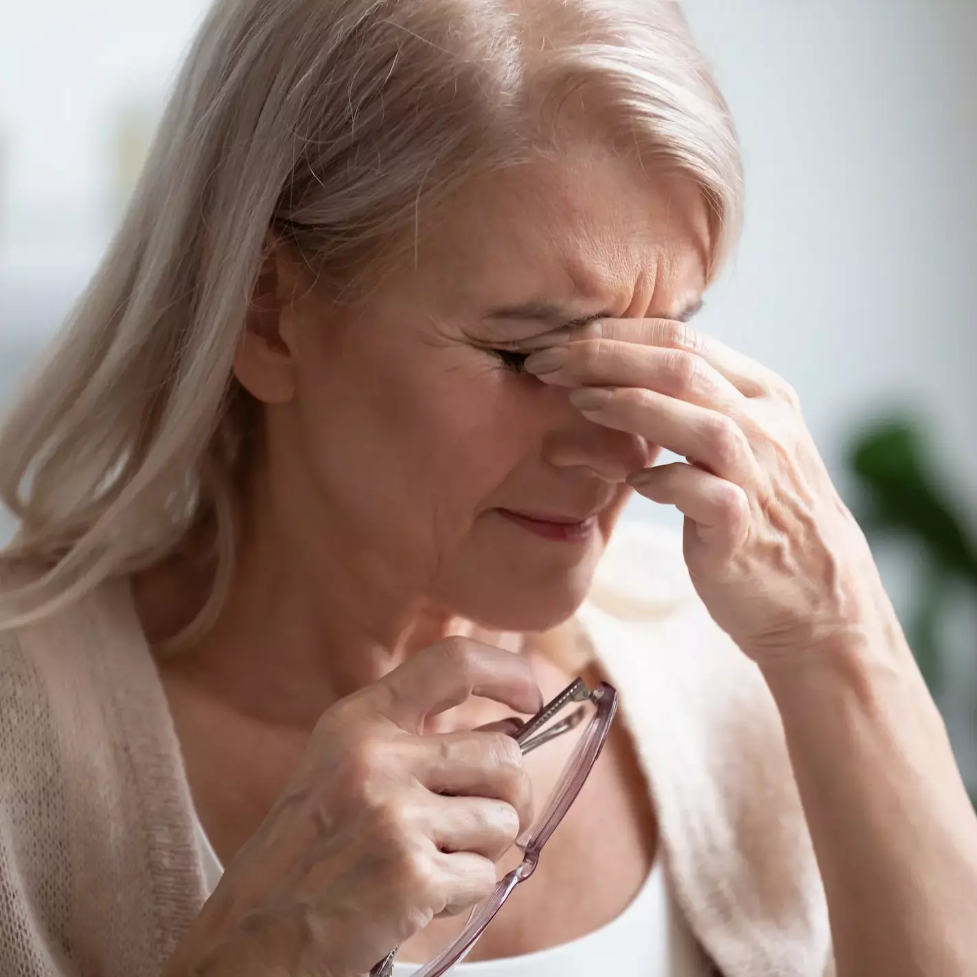 A lady with eye fatigue
