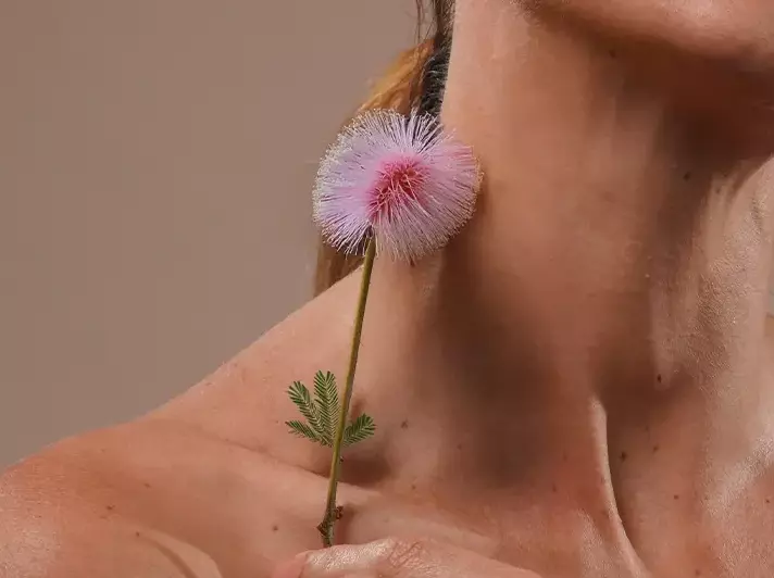 A woman looking happy using the product