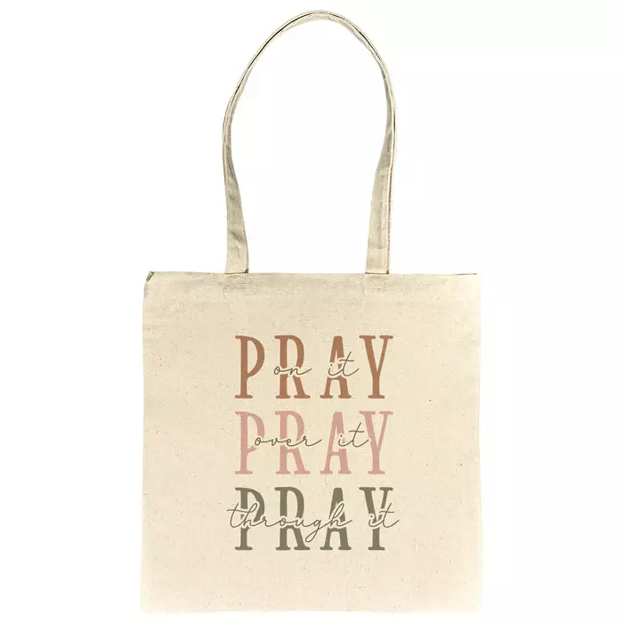 tote bag says Pray on it, Pray over it, Pray through it