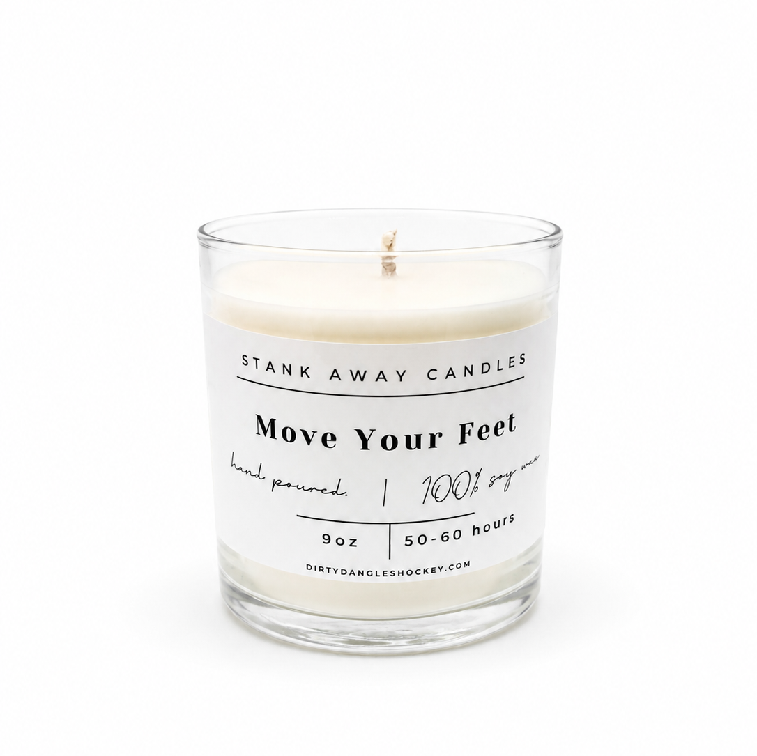 A white scented hockey candle on a white background. Move Your Feet
