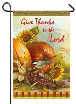 Give thanks to the Lord next to an image of pumpkins, sunflowers, and dried ornamental corn