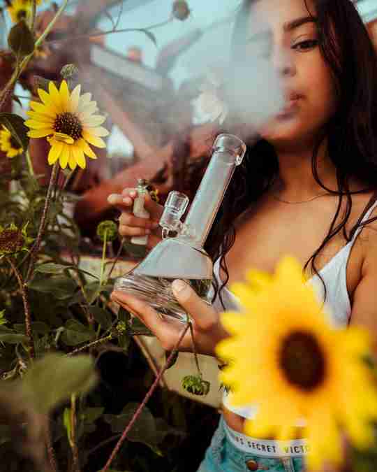 woman smoking a bong
