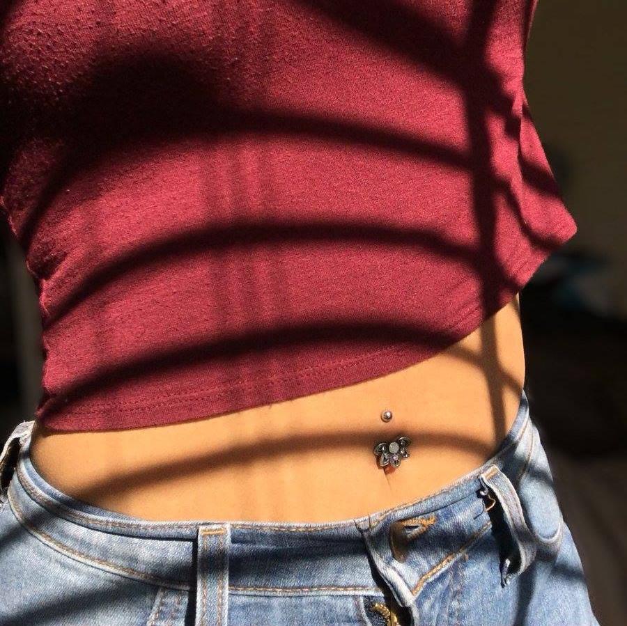 Rate your navel piercing pain or drop any questions in the