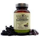 Bottle of herbal roots eldermune elderberry with capsules on the right and elderberries on the left of the bottle.