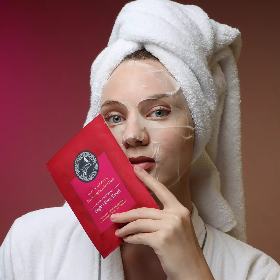 Model wearing and posing with Dim n Dazzle Sheet mask