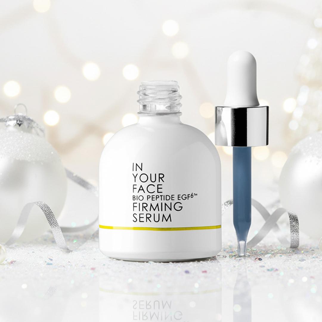 BIO PEPTIDE EGF6 FIRMING SERUM on mantel with holiday decor