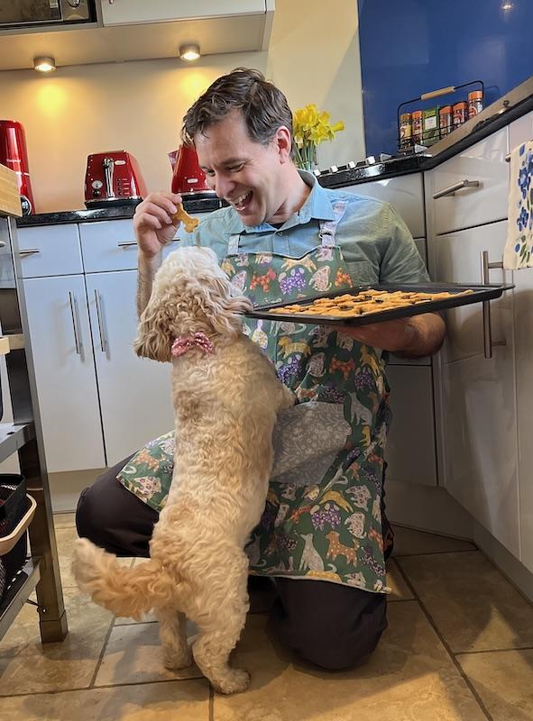 dog in kitchen waiting for bake at home treats