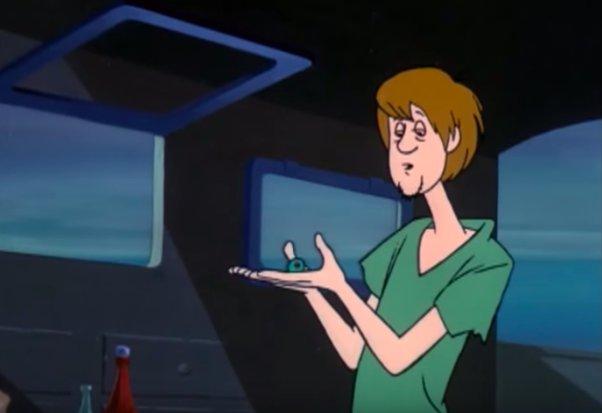 Cartoon image of Shaggy from Scooby-Doo with red, confused eyes, separated from the group, illustrating the stoner horror "Don't Separate from the Group (The Scooby Rule)" for surviving a scary movie marathon.