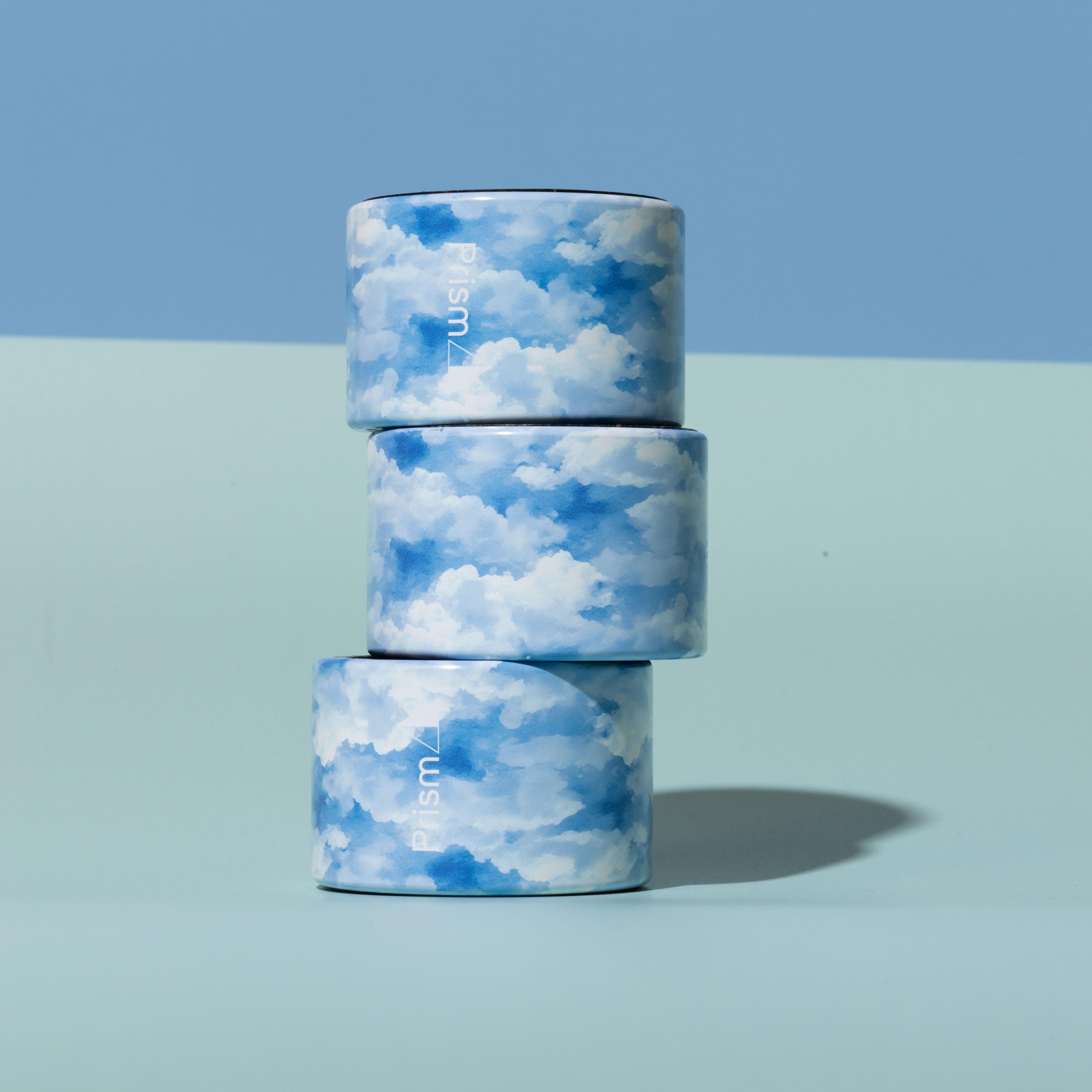 An image of a stack of Prism halo connectors in the cloud and sky design, stacked on top of each other