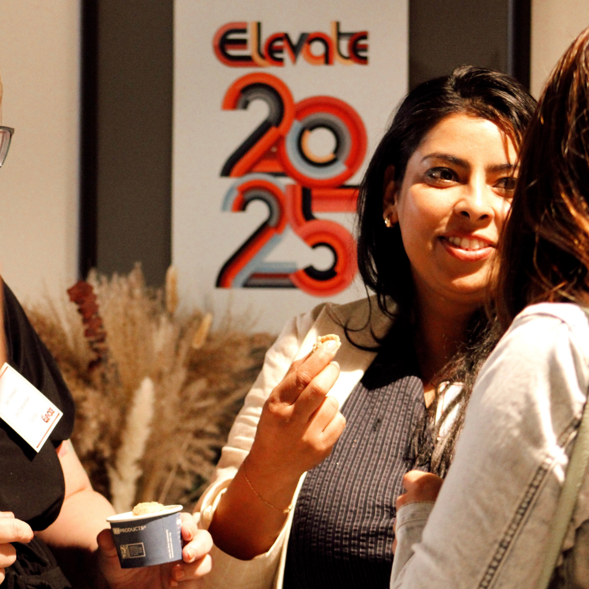 girl wtih cookie in at an event