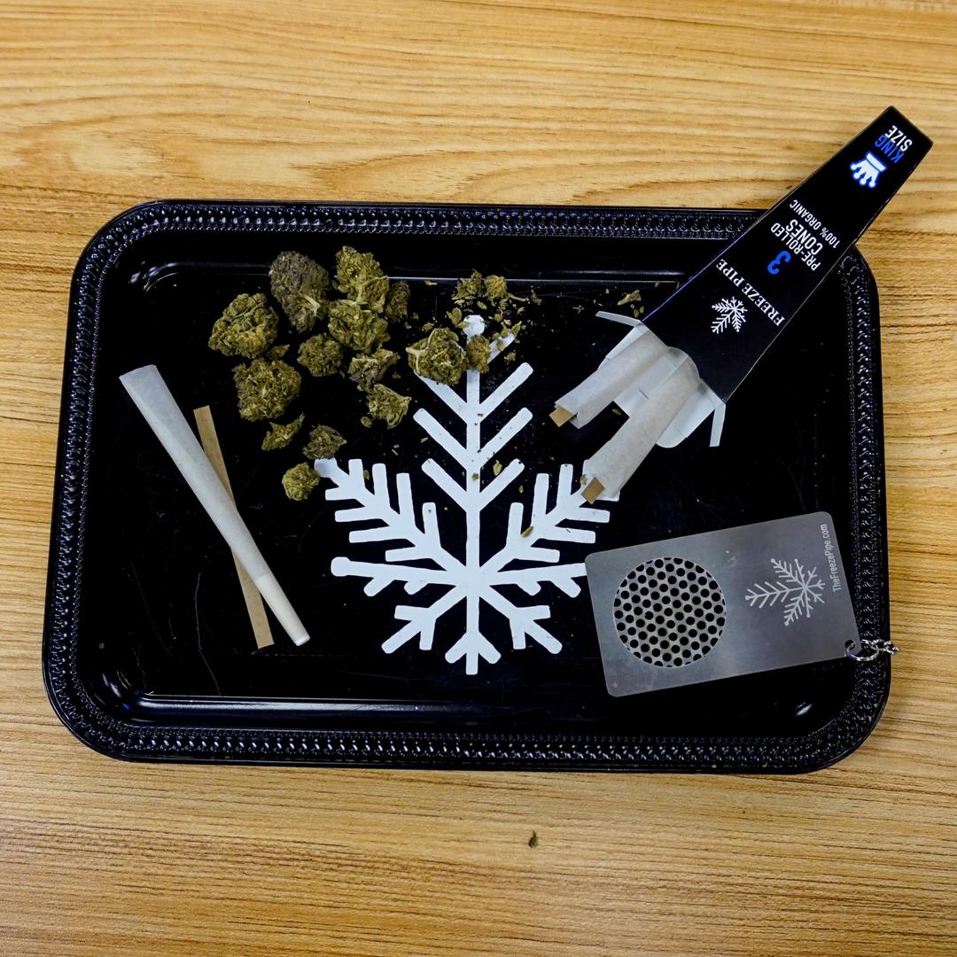 weed, king sized cones and grinder