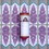 iYURA Manjish Glow Elixir Cylinder on a backdrop of its beautiful Madhubani Manjish artwork