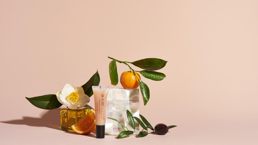 Boom Gloss with flowers and citrus 