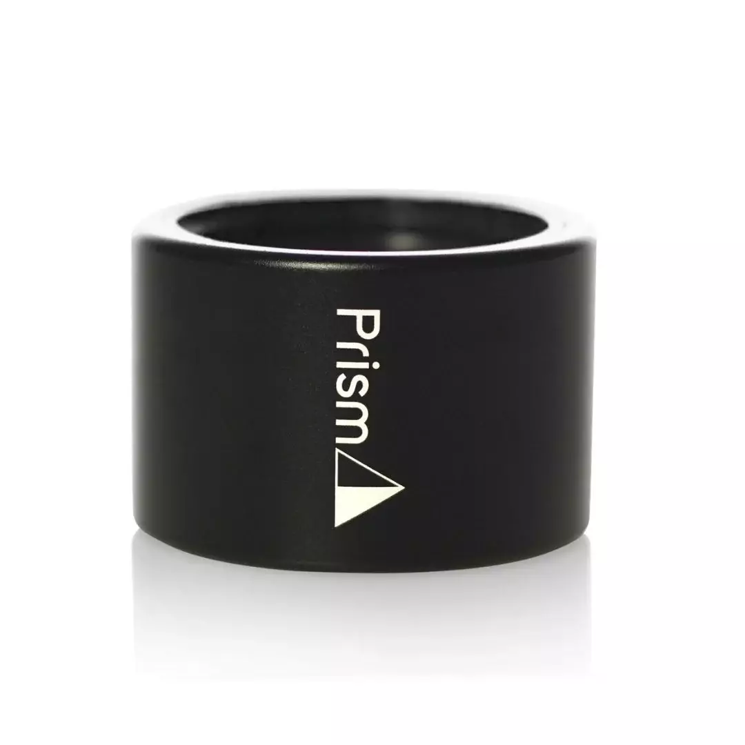A Black Prism Halo Connector, the proprietary anodized aluminum heart of the modular water pipe system. This dual-threaded ring utilizes smoke-safe silicone gaskets to create a 100% airtight and waterproof seal, allowing users to securely connect and swap modular glass bases, percolators, and mouthpieces.