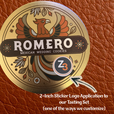 romero cookie tin with 2 inch sticker logo example