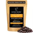 One 12oz bag of Lone Wolf Coffee’s Half Moon Decaf Medium Roast Whole Bean coffee bag product photo