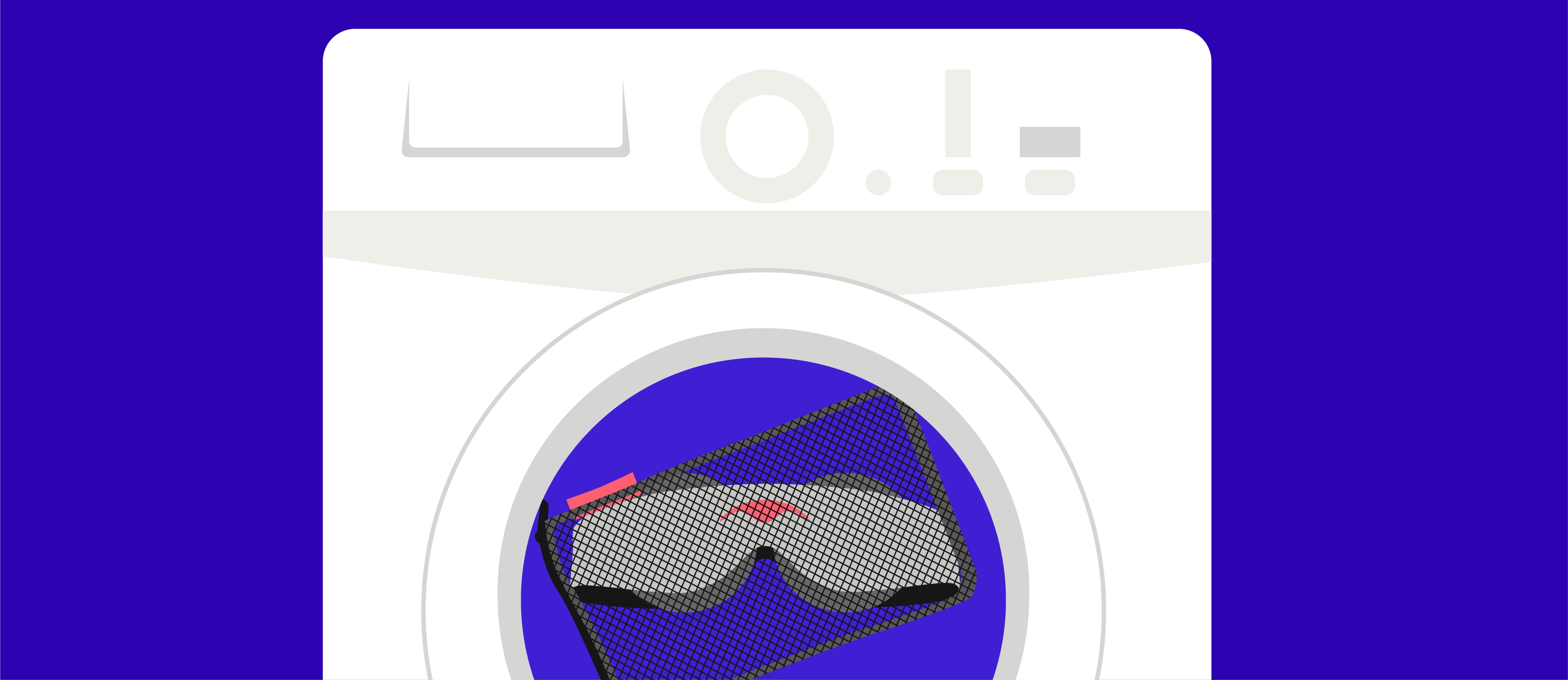 A sleep mask inside a black mesh storage bag inside a washing machine.