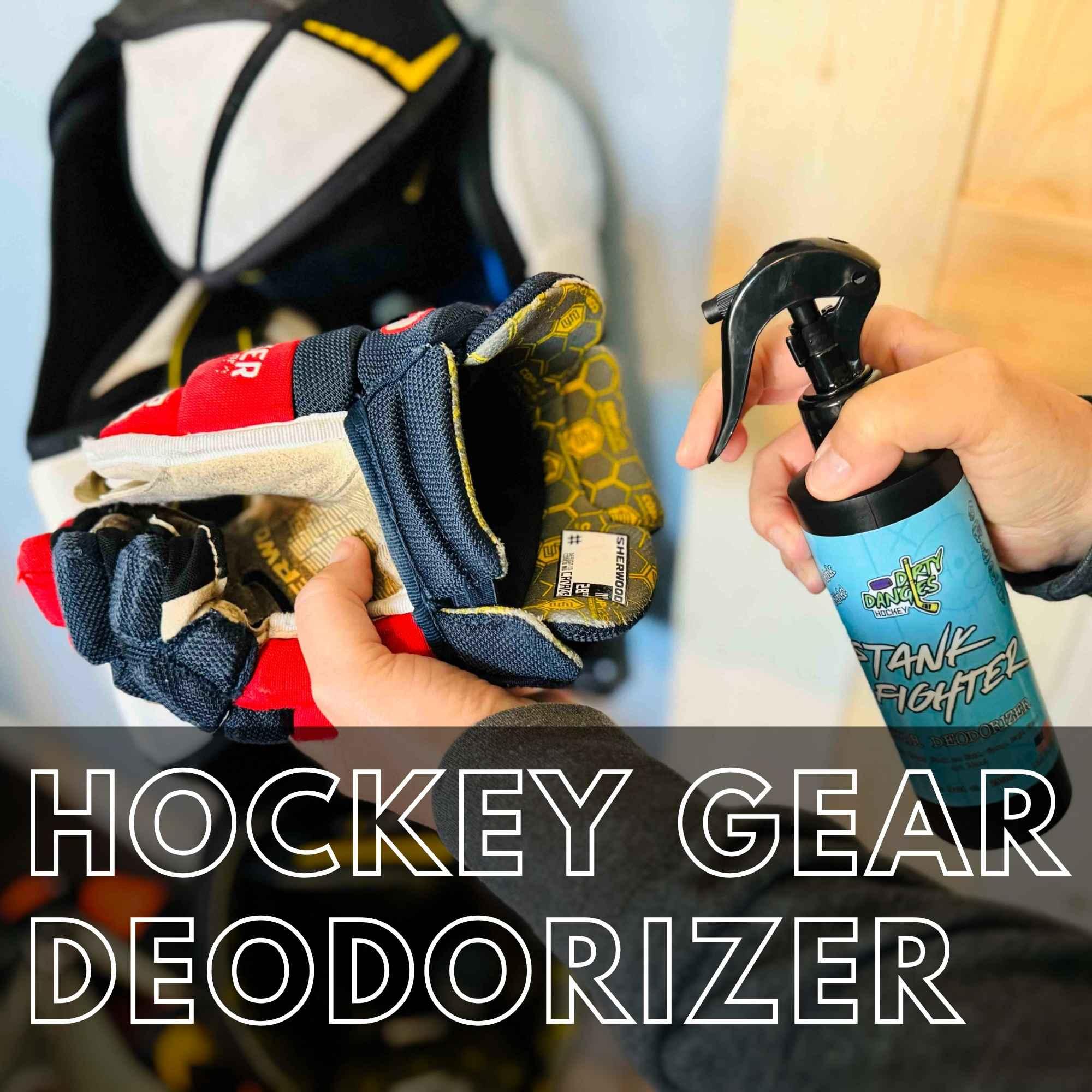 Dirty Dangles hockey gear deodorizer being sprayed inside hockey gloves. Hockey Gear Deodorizer