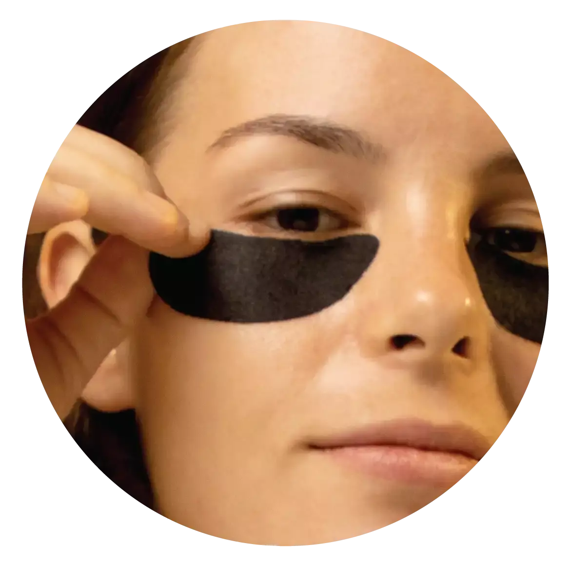 applying patch under eyes 1
