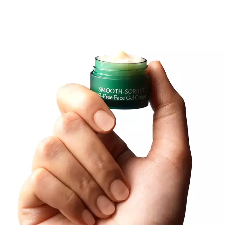 Woman holding mini smooth sorbet creme