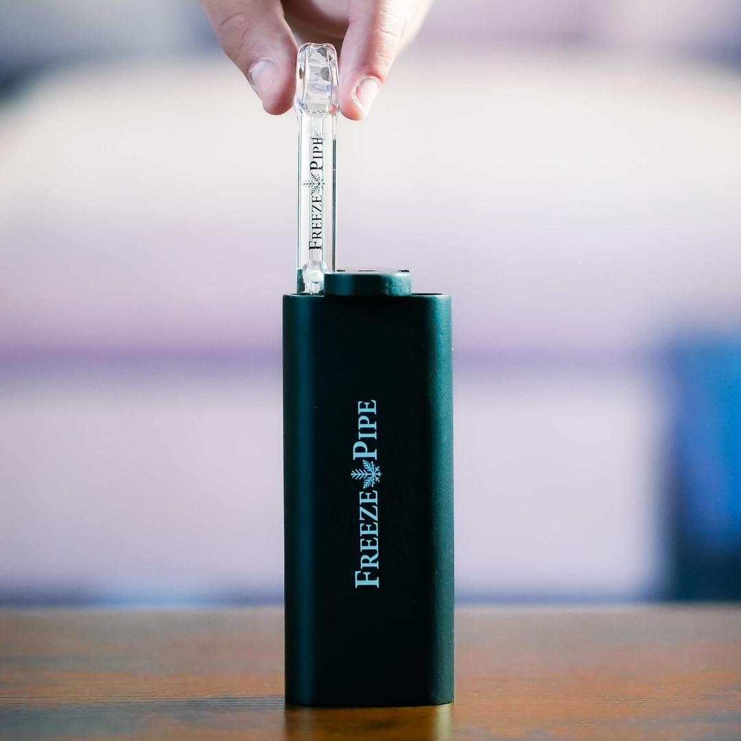 glass one hitter being inserted into dugout