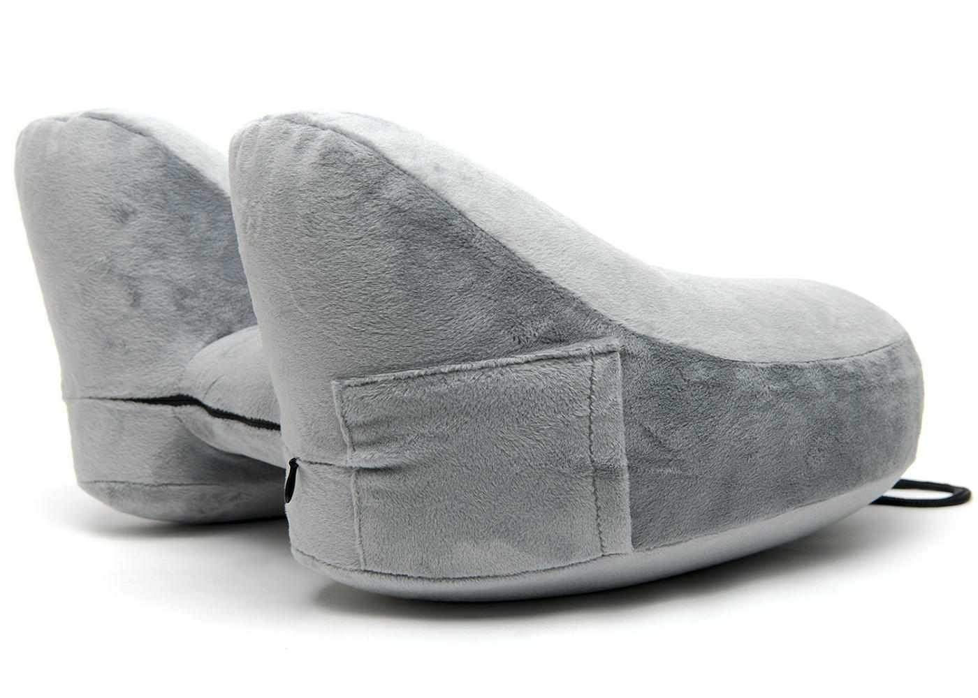 A gray inflatable travel pillow with a side pocket to store small items.