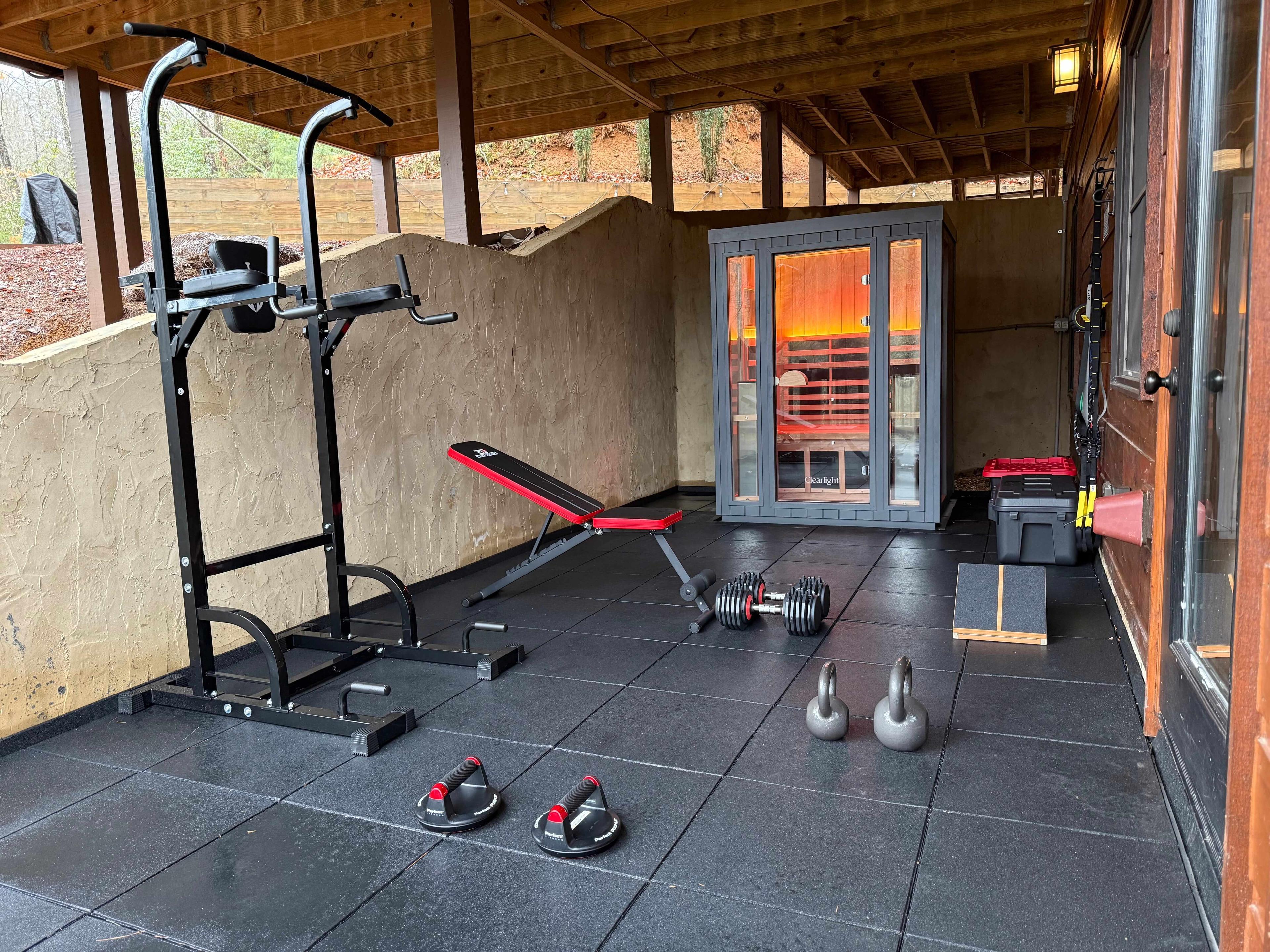 • Outdoor gym with adjustable free weights, kettlebells, pull-up and dip station, TRX® suspension system, resistance bands, and workout bench.