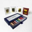 Quartana Complete Discovery Kit shown with its blue slide box and several white sample cards arranged on a clean white background.