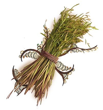 A tied bunch of nut grass, kept on an artwork