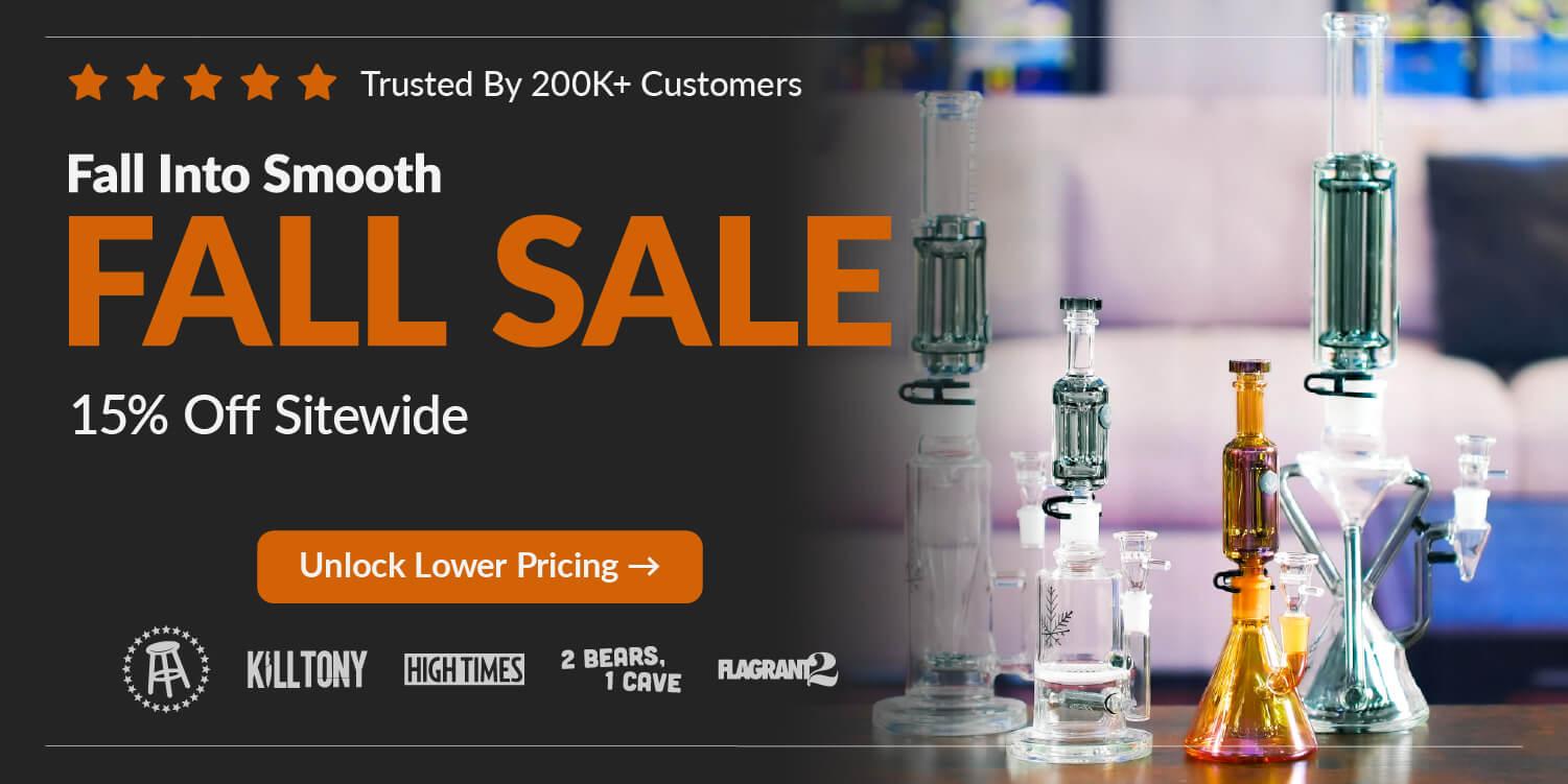 glass bongs on table in front of couch