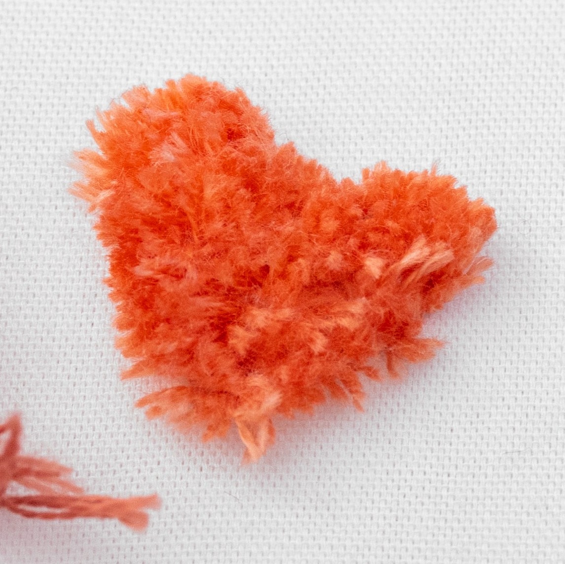This is an image of a heart snipped version of turkey stitch.