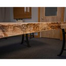 edge of live edge maple wood slab desk