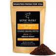 One 12oz bag of Lone Wolf Coffee’s Half Moon Decaf Medium Roast Coarse Ground coffee bag product photo