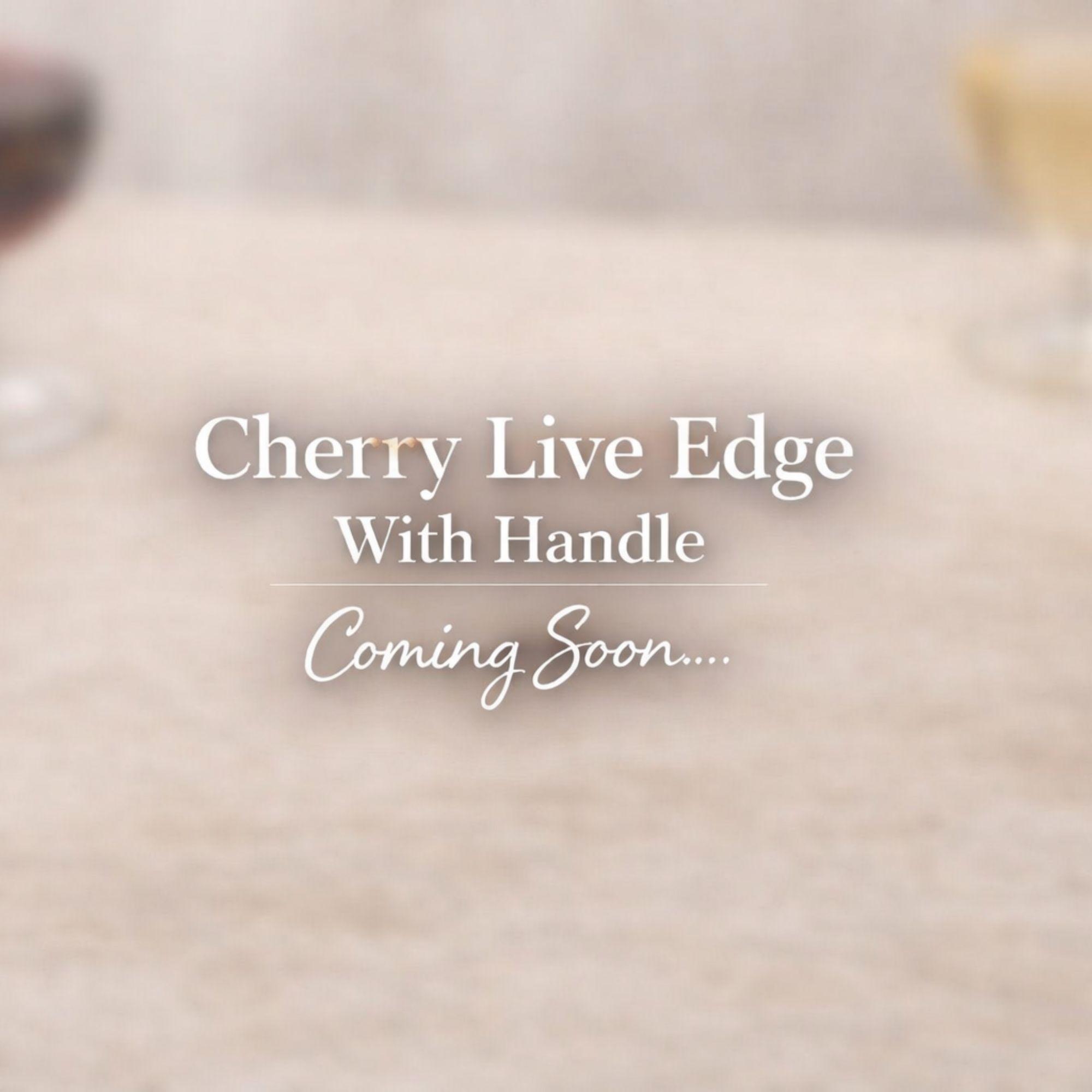 Personalized live edge maple cutting board with carved out handle. Styled with charcuterie, perfect for wedding and housewarming gift ideas