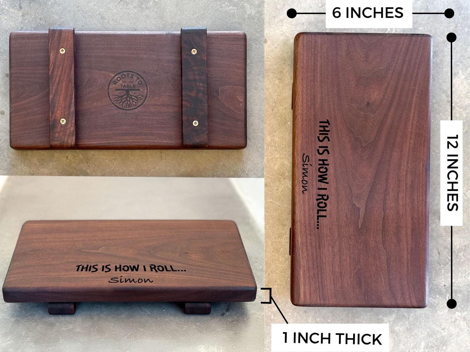The top, bottom showing feet and front view of a walnut sushi platter showing iits sixe of 6 inches by 12 inches and 1" thick plus 3/4 inch thick feet/