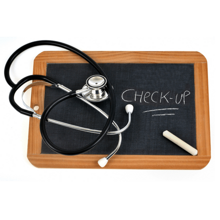 check-up écrit sur un tableau
