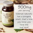image shows a wooden table with a white bowl sitting on a small piece of burlap. Bottle of Herbal Roots Valerian Root next to a basket with valerian leaves on it. A small bowl of valerian root is in the background and there are a few capsules in front of the bottle. The text on the image says 900 mg per serving. Valerian naturally has a pungent smell, that's how you know you have the real deal!