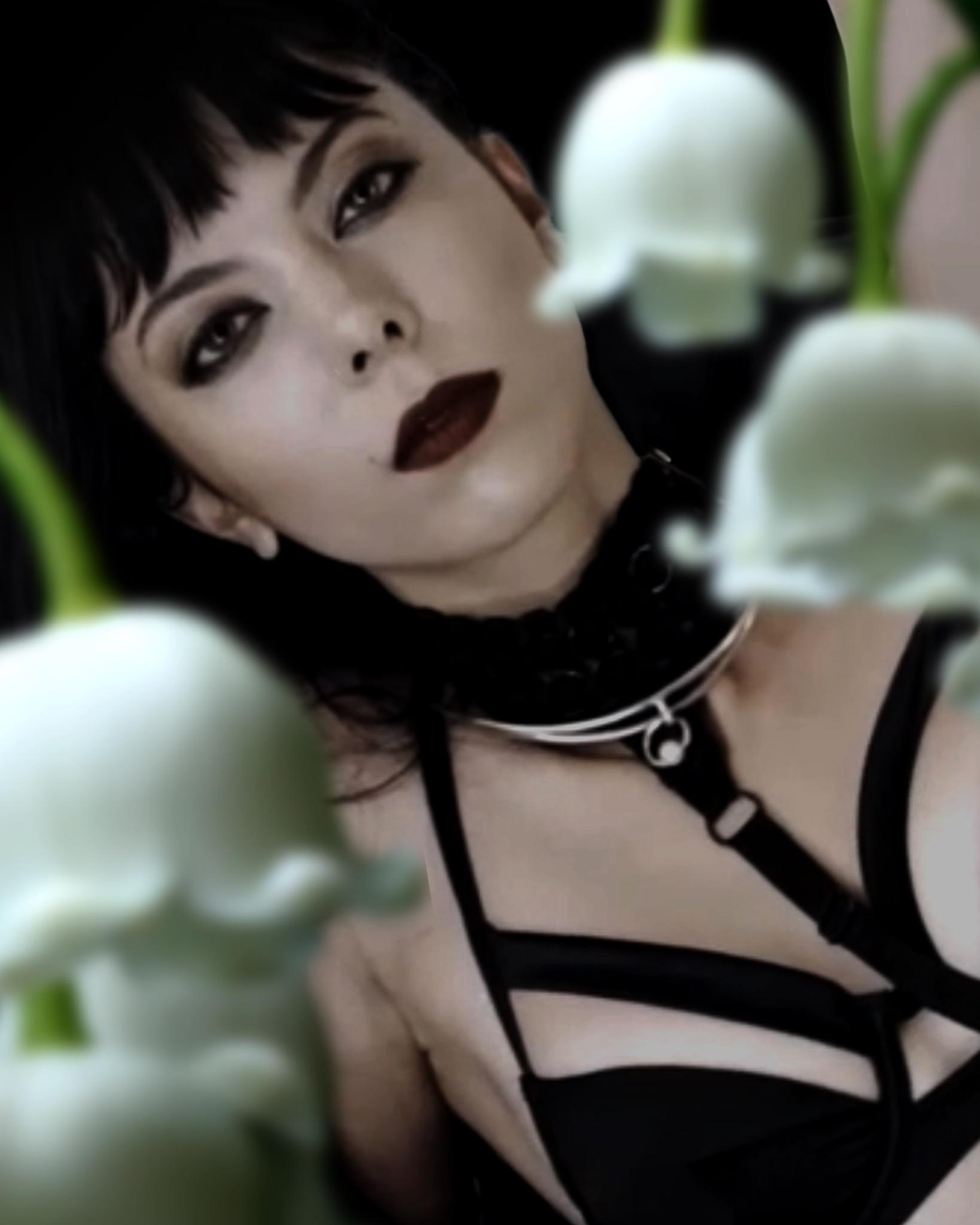 Lily of the Valley eau de parfum editorial image featuring 'Death' and lily flowers.