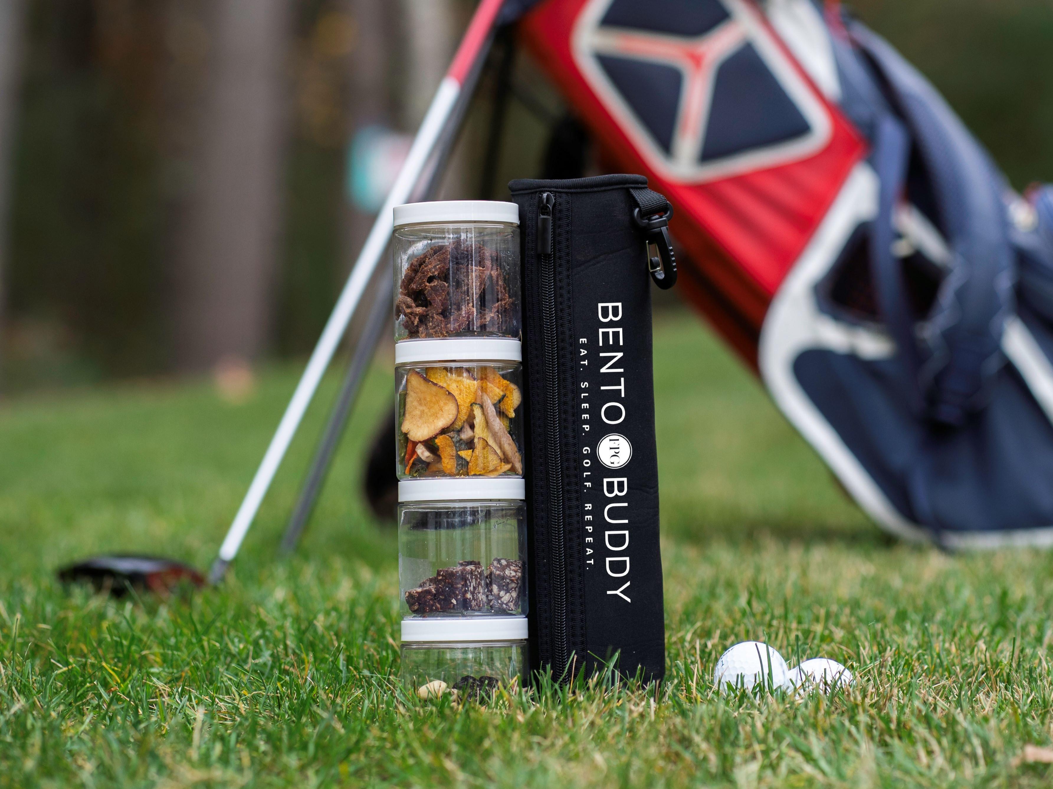 Golf snack carrier next to golf balls