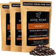 Three 12oz bags of Lone Wolf Coffee’s Amara Medium-Light Roast Whole Bean coffee bag product photo