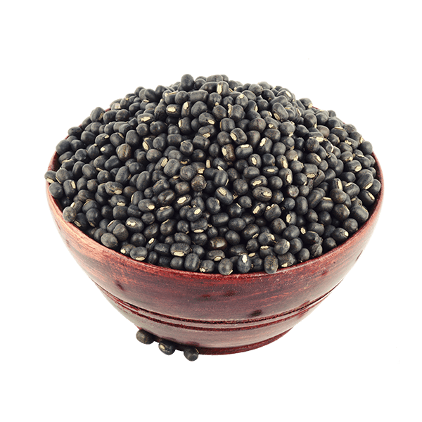 A bowl of black grams surrounded by floral artworks