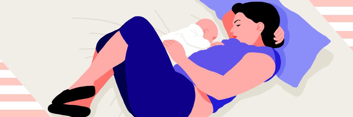 A woman bed sharing with her baby, using a safe sleeping position for co-sleeping, the c shape.